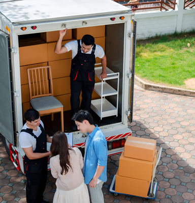 Office moving team packing and assembling furniture safely – Easy Best Moves